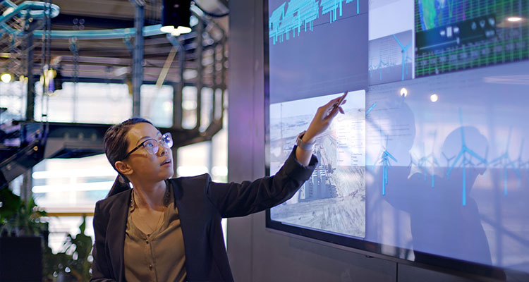 Worker uses large screen