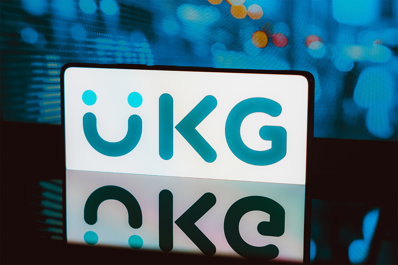 UKG logo on phonescreen to support new CEO Jennifer Morgan article