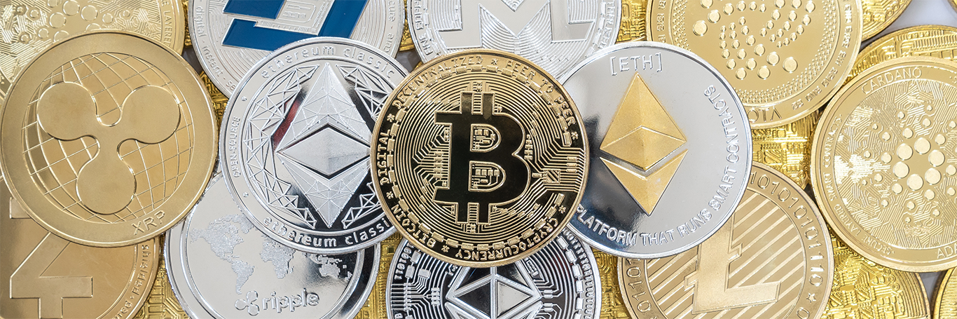 Various different cryptocurrencies laid out in coins to support CEO embezzlement article