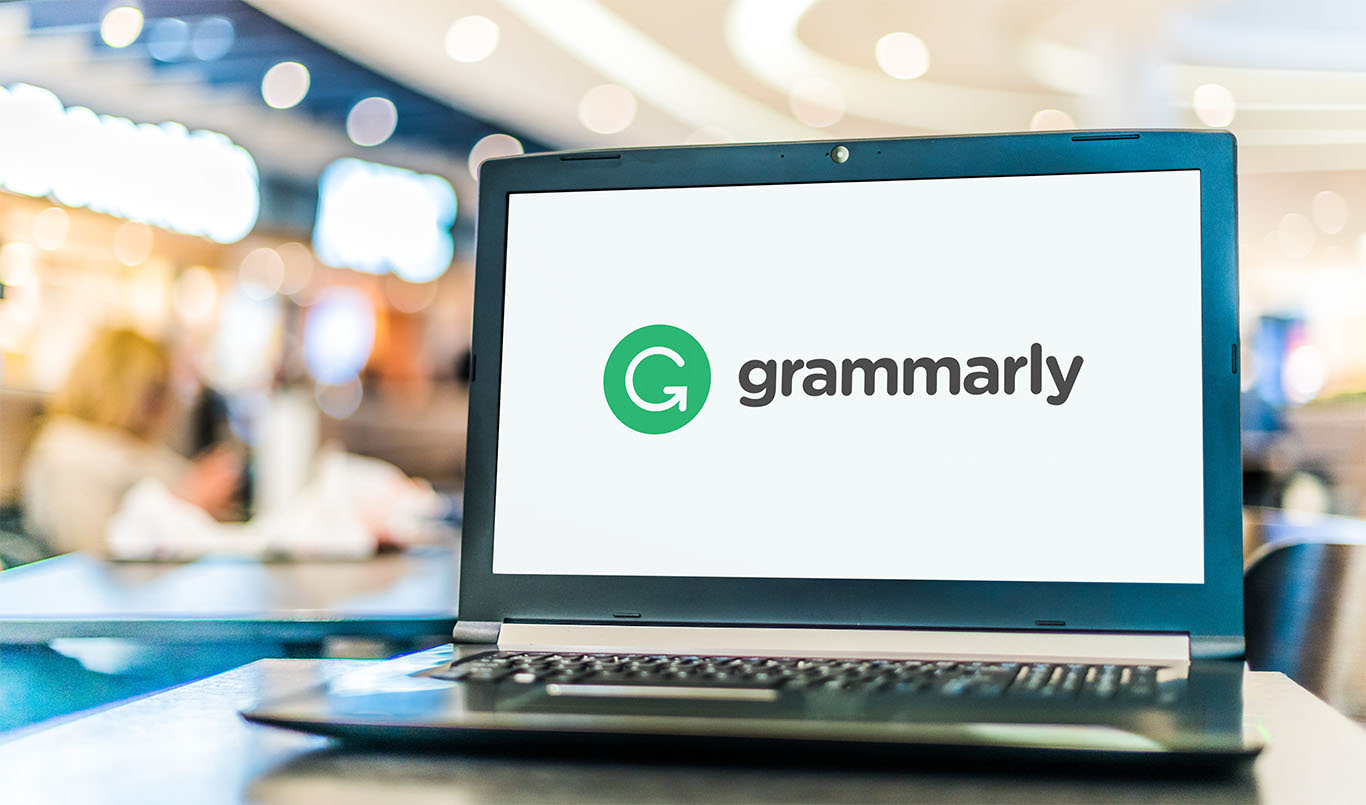 Grammarly logo displayed on laptop screen to support Superhuman acquisition and AI email strategy article