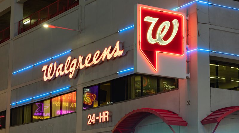 Winx Health product display in Walgreens pharmacy aisle with customer browsing